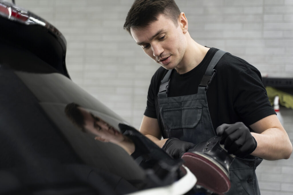 Close-up of professional car care and exterior cleaning process