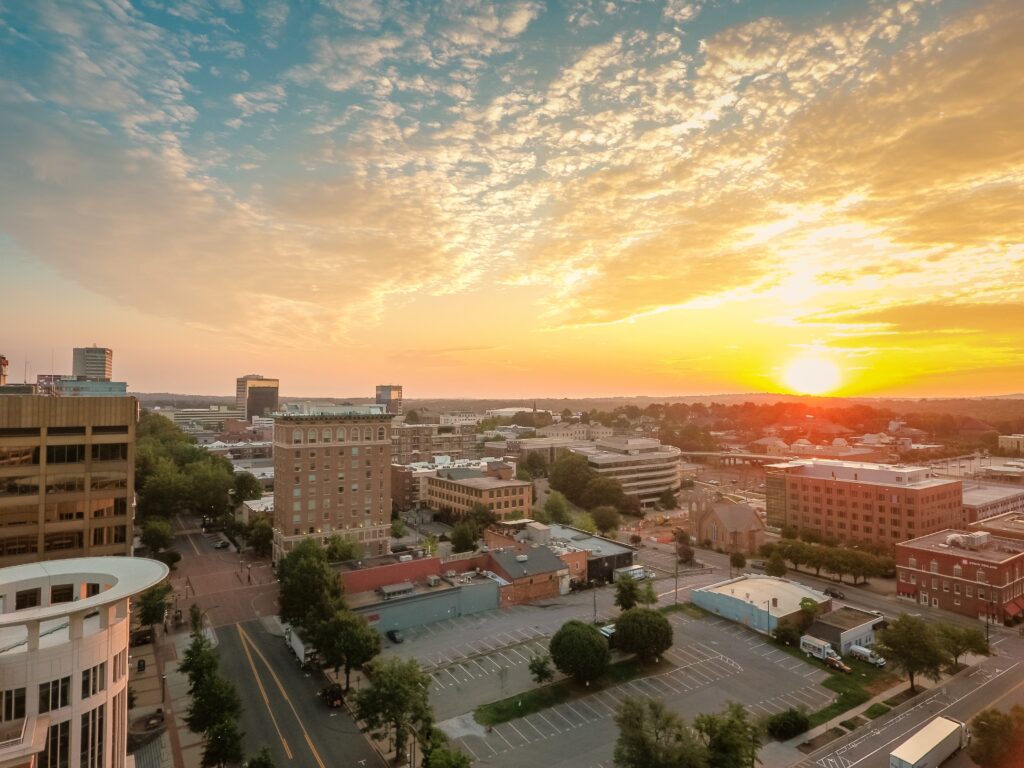 Aerial cityscape of Greenville, South Carolina during sunset