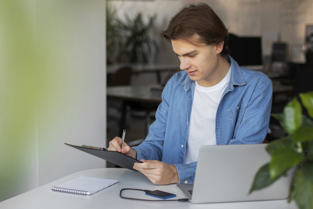 Man accessing external storage unit for maintenance work